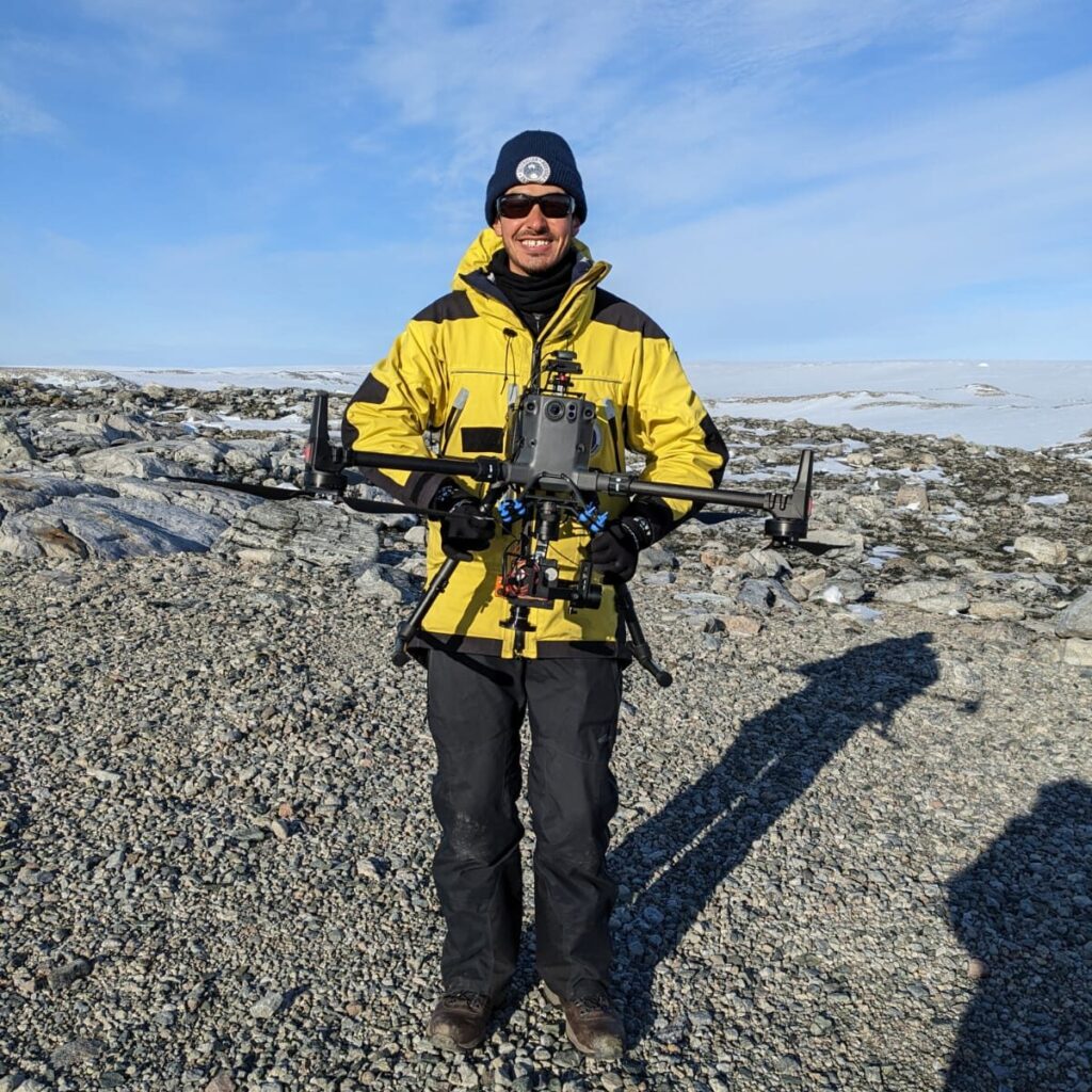 Juan holding an M300-RTK with a hyperspectral camera for drone surveys in Antarctica